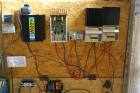 the charge control board les guis virlet puy de dome france stand alone renewable energy farm solar panels wind turbines copyright free photo royalty free photo