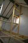 fitting second upright and horizontal supports les guis virlet puy de dome france stand alone renewable energy farm solar panels wind turbines copyright free photo royalty free photo