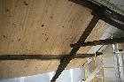 tongue and grooving in attic les guis virlet puy de dome france stand alone renewable energy farm solar panels wind turbines copyright free photo royalty free photo