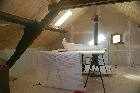 sanding and patching the attic walls les guis virlet puy de dome france stand alone renewable energy farm solar panels wind turbines copyright free photo royalty free photo