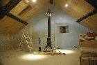 painting the attic walls les guis virlet puy de dome france stand alone renewable energy farm solar panels wind turbines copyright free photo royalty free photo