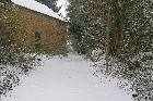 snow at back of house les guis virlet puy de dome france stand alone renewable energy farm solar panels wind turbines copyright free photo royalty free photo